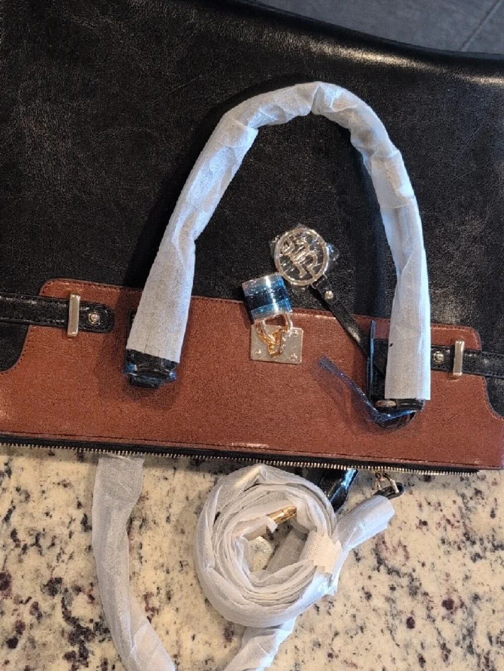 Bostanten Two-Tone Black and Brown Leather Tote with Gold Accent Charm
